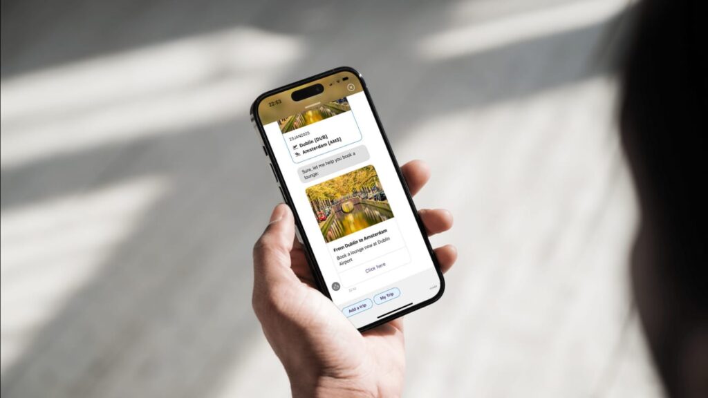 Hand holding phone with a app open