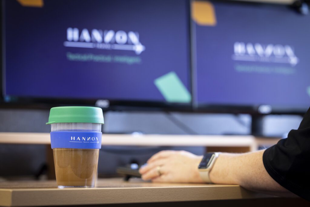 Hannon Travel Branding on PC and Cup
